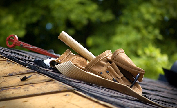 Fallen trees can cause roof damage sometimes covered by homeowners insurance
